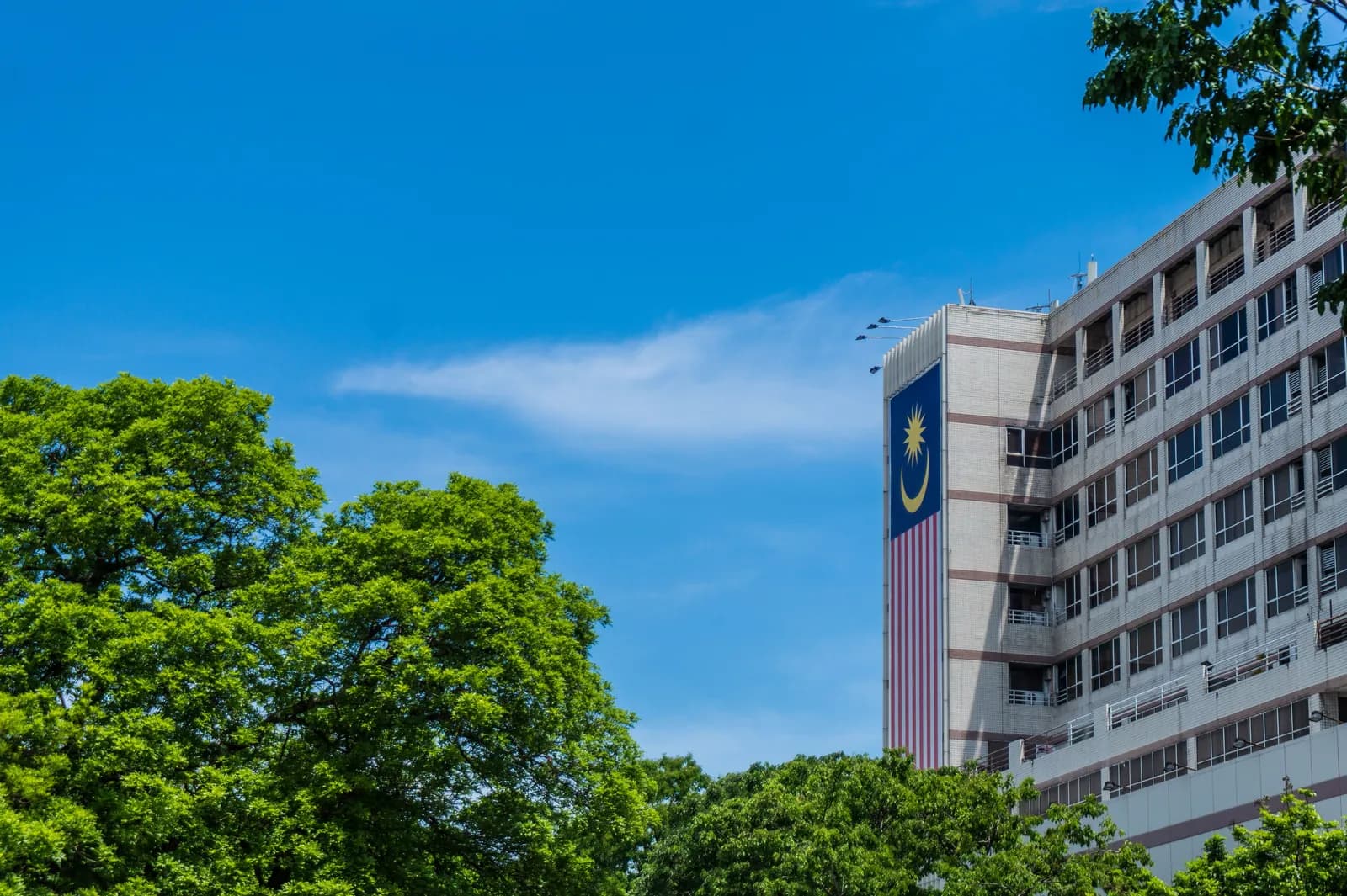No AI Act Needed: Why Singapore's Three-Layer Governance Model Prizes Proof Over Statutes